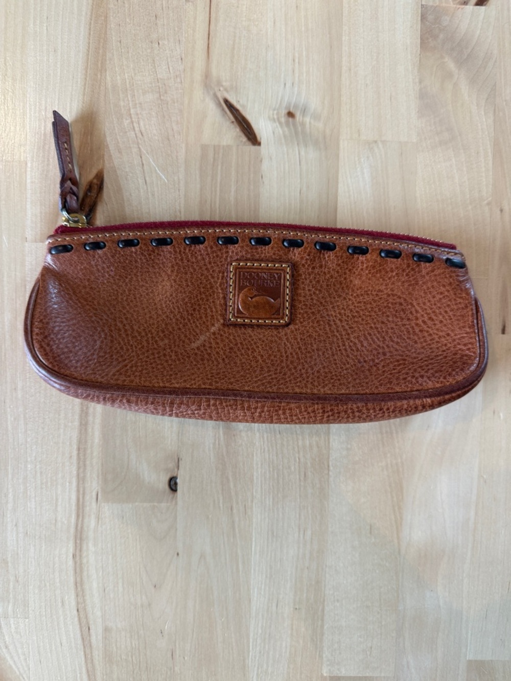Dooney & Bourke Tan Pebbled Leather Zip Pouch with Red Trim